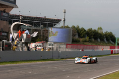 The Lola-Aston takes the flag